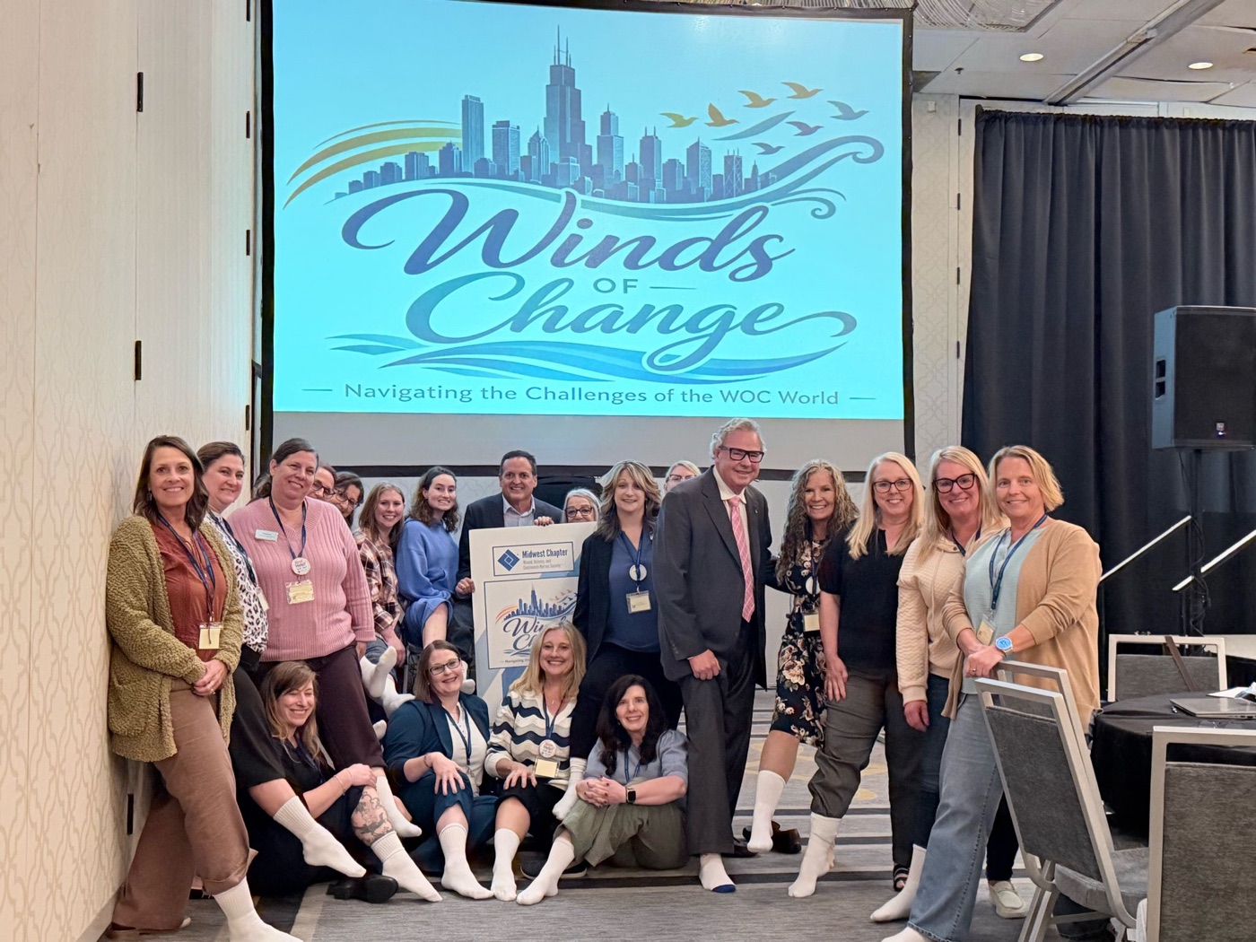 Winds of Change conference attendees wearing white socks for the White Sock Campaign