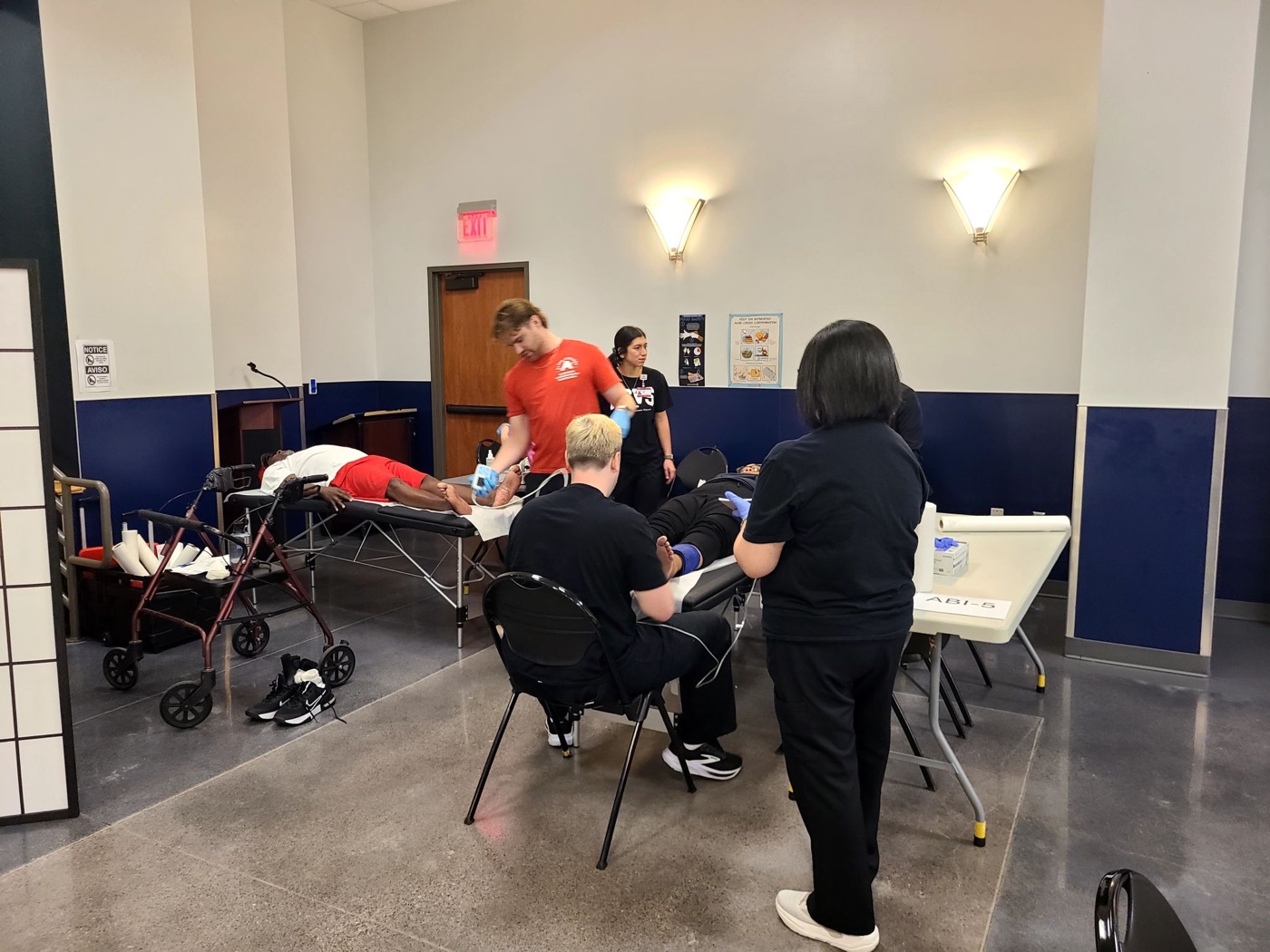Clinicians screening residents at the Houston community screening